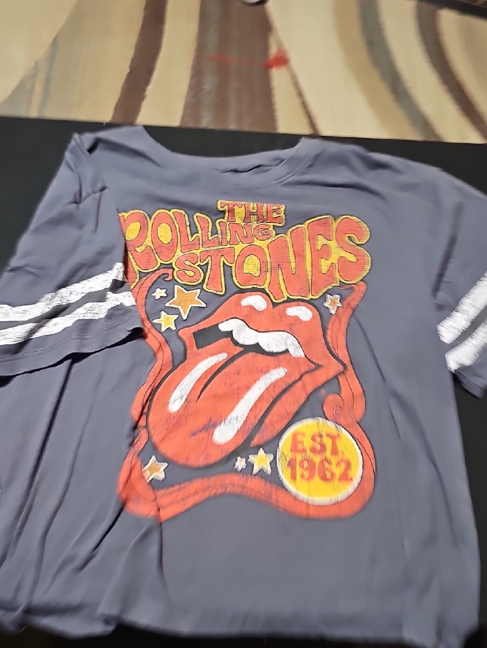 the Rolling Stones Kids Short Sleeve Tee in Charcoal Gray with Red Graphic